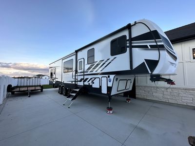 2022 Keystone fusion with 14 ft separate garage