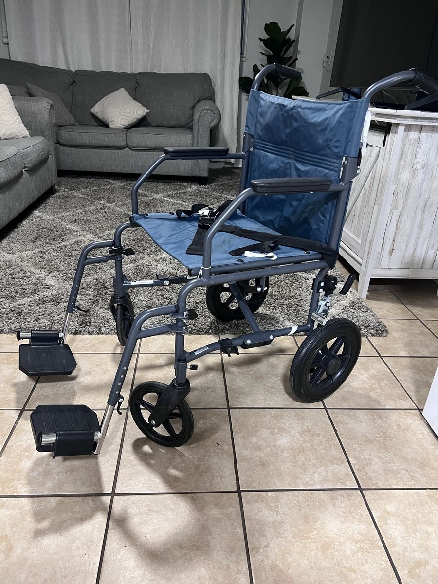 Medline Lightweight Transport Wheelchair with 12" Rear Wheels and Swing-Away Leg Rests