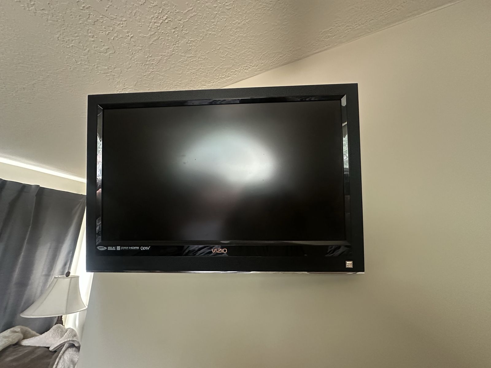 31in VIZIO TV with Apple TV and swivel mount