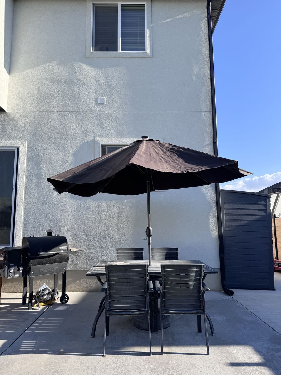 Patio table, chair and umbrella