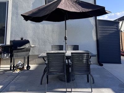 Patio table, chair and umbrella