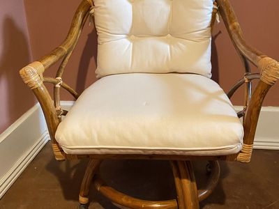 Rattan Swivel Rolling Chair with Off-White Tufted Cushions
