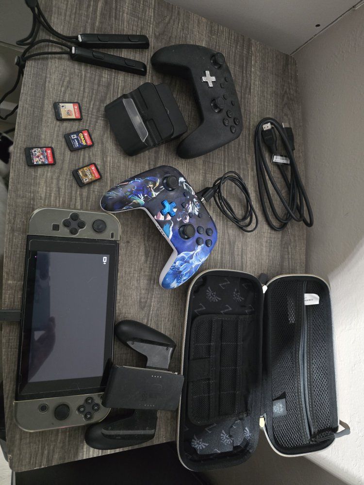 Nintendo Switch Bundle with 4 Games, 2 Pro Controllers, and Zelda Case