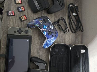 Nintendo Switch Bundle with 4 Games, 2 Pro Controllers, and Zelda Case