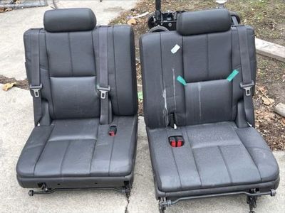 2007–2014 Chevy Tahoe, Suburban, GMC Yukon, or Cadillac Escalade. Third row seats
