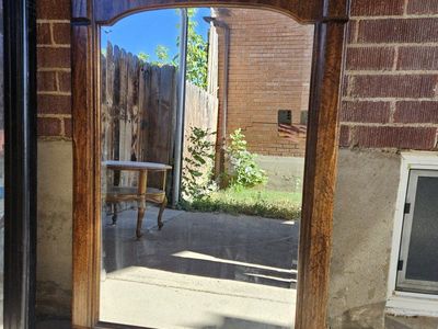 Vintage Wood Pediment Mirror and Modern Black Framed Mirror