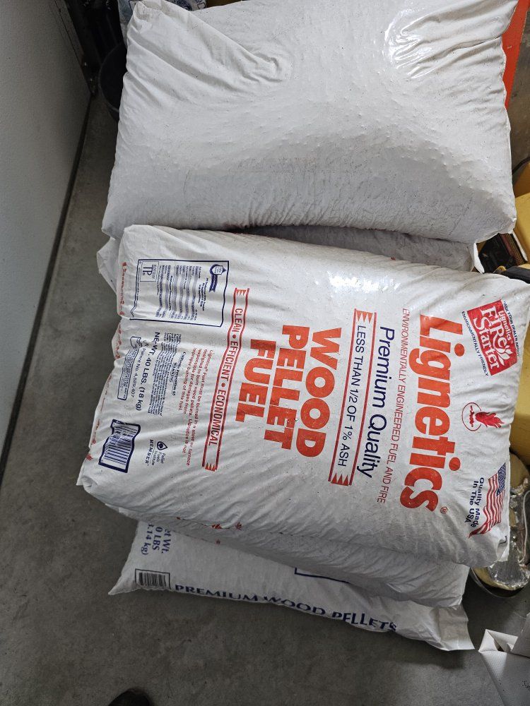 9 new bags wood pellets for pellet stove