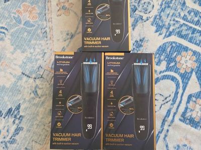 Brookstone Cordless Rechargeable Men's Electric Hair Trimmer with Included Vacuum