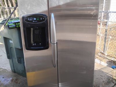 Maytag Stainless Steel Side-by-Side Refrigerator with Ice & Water Dispenser 200 dollars OBO