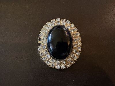 Black Oval Brooch W/ Rhinestones (missing 2)