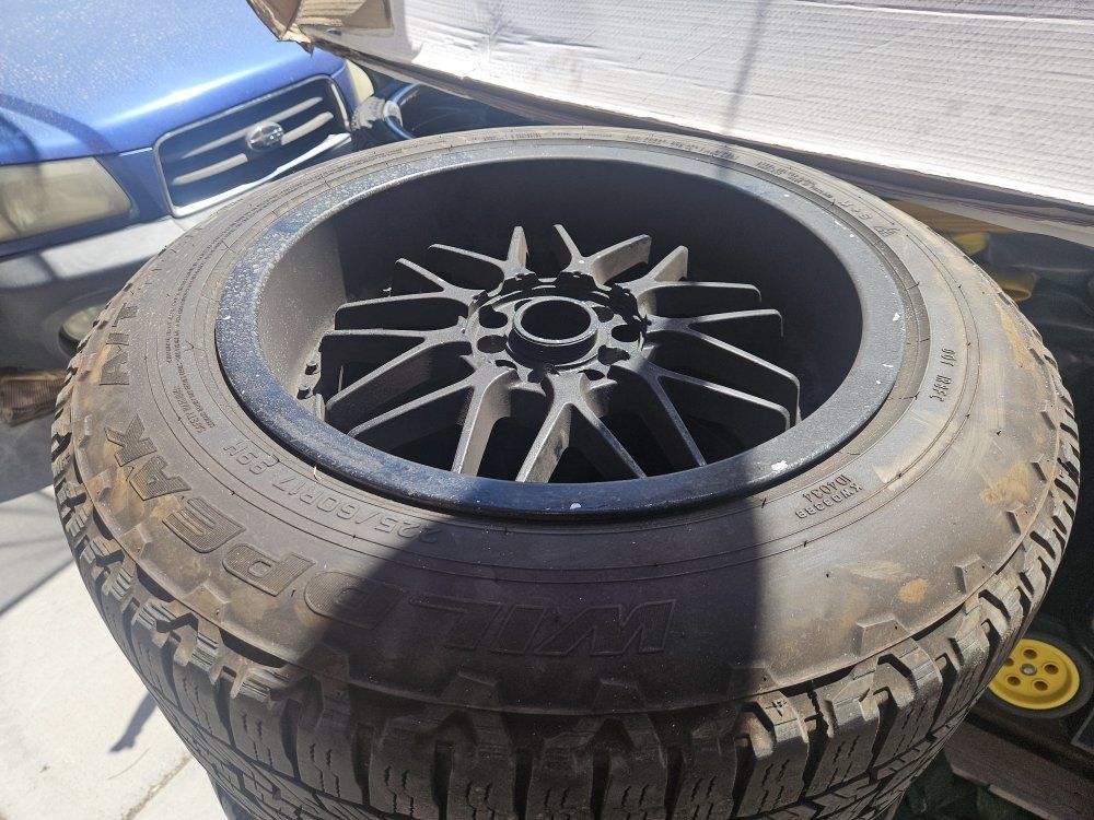 Falken Wildpeak A/T 225/60R17 Tires with Black Rims - Set of 4