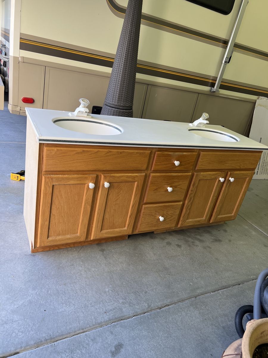 Bathroom cabinet with dual sinks
