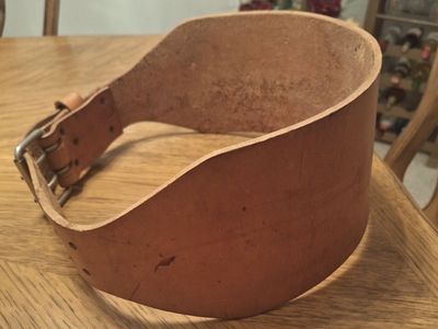 Used Leather Weightlifting Belt. 46" long and about 6.3 mm thick.