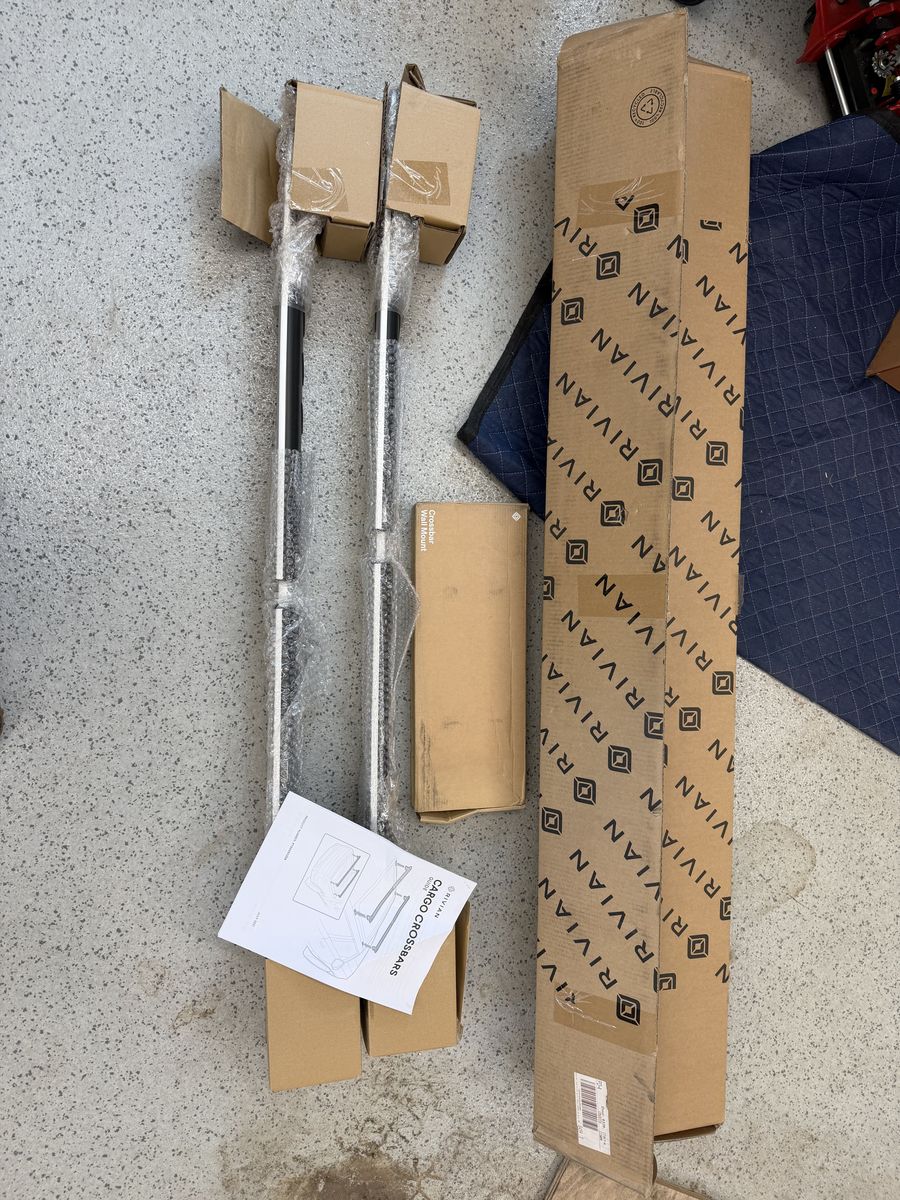 Rivian Cargo Cross Bars Brand New in Box, Brand new Bar wall hanger and like new Chilwich floor mats for R1T Gen 1