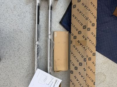 Rivian Cargo Cross Bars Brand New in Box, Brand new Bar wall hanger and like new Chilwich floor mats for R1T Gen 1