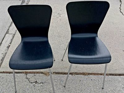 Set of 2 Black Chairs with Metal Legs - Scratches present. The legs were somewhat bent when purchased and have been straightened