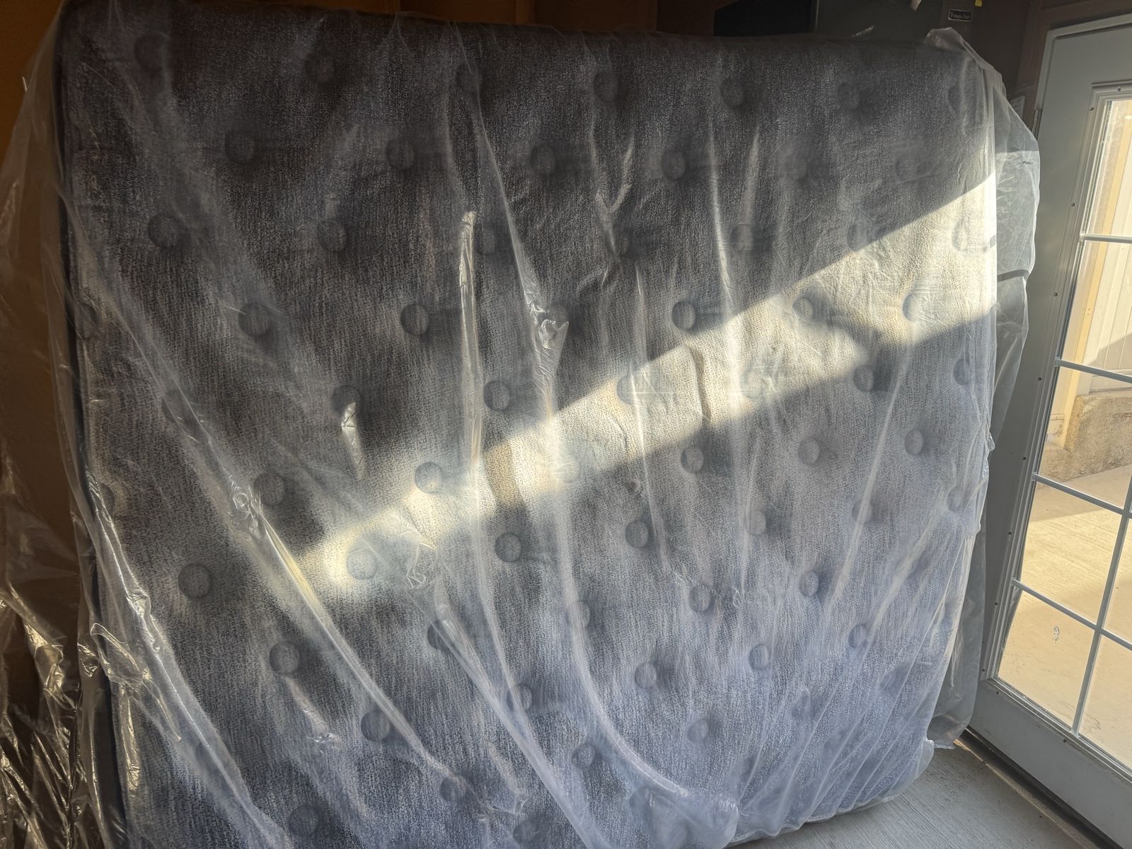New King Size Mattress in Plastic - Ready for Your Bedroom