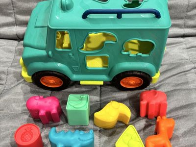 B. Toys Rollin’ Animal Cruiser Shape Sorter Truck