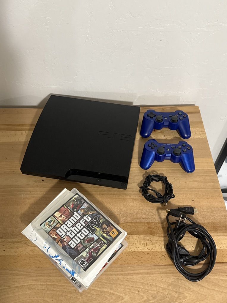 PlayStation 3 slim 120GB w/2 controllers & 5 games