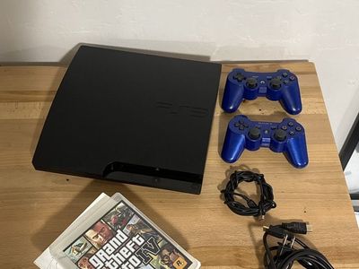 PlayStation 3 slim 120GB w/2 controllers & 5 games