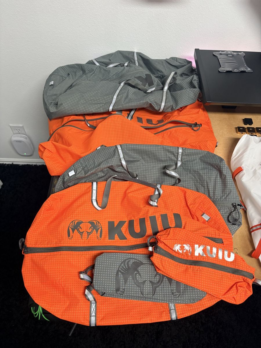 Kuiu Extreema Orange Dry Bags (2 large, 2 medium, 2 small) in orange and gray for Hunting & Outdoors Gear Storage