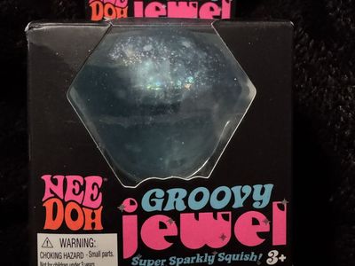 brand new RARE blue groovy jewel nee doh