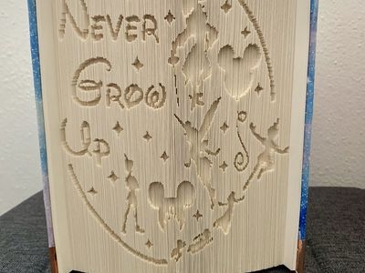 Handmade Peter Pan "Never Grow Up" Folded Book Art with Galaxy Cover & Corner Protectors