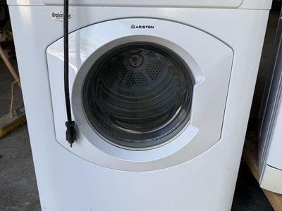 Ariston TVM63X dryer and Ariston ARWXF129W washer stackable combo