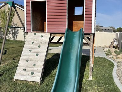 Kid's Outdoor Playhouse with Slide & Climbing Wall