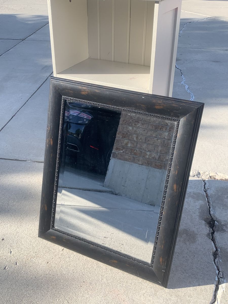framed mirror - 1’ and a half by 2’