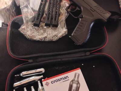 This is a .177 caliber some ammo 21 air tanks and three clips 19 round capacity in a zipper case