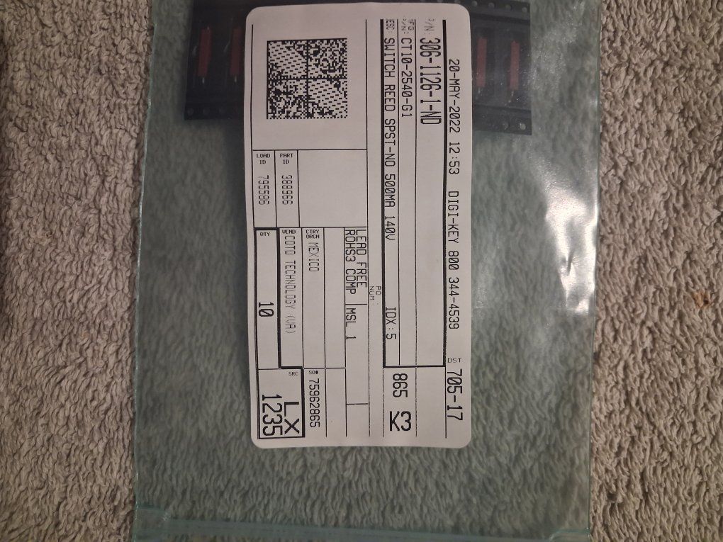 encapsulated dry reed switches