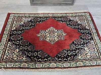 Striking Handwoven Persian Wool Rug