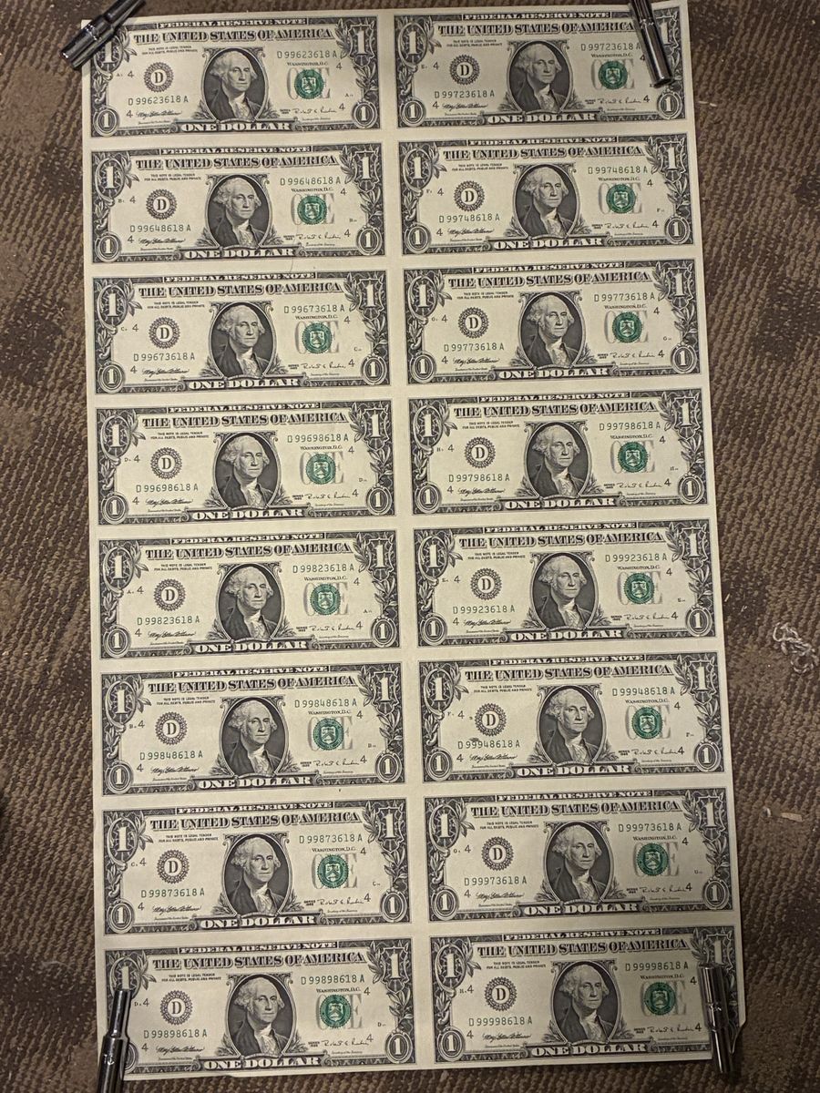 Uncut sheet of US one dollar bills