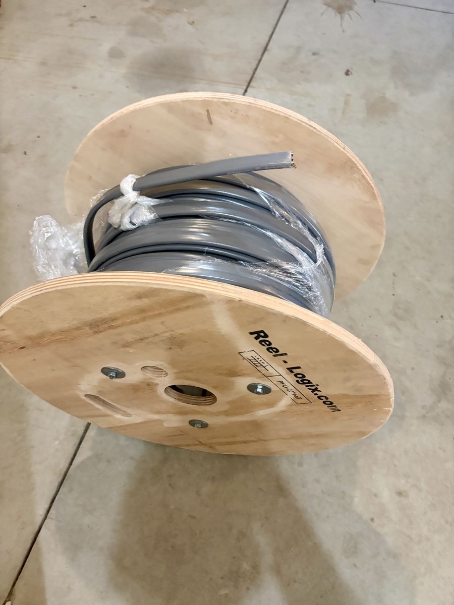 180 feet of 8 gauge underground 3 wire, 8/3 UF NMC with ground.