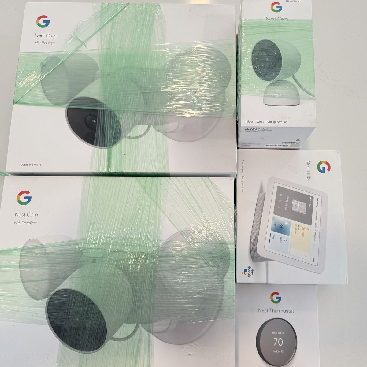 4 Google Nest Cameras, Thermostat And Hub