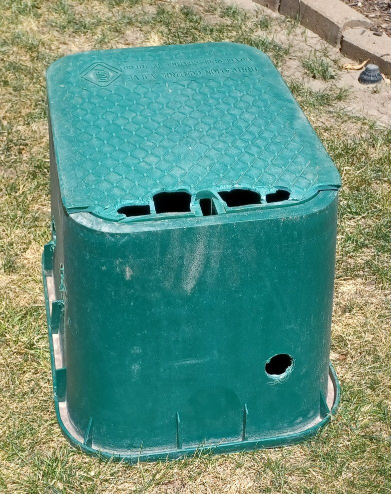 sprinkler valve box with broken lid
