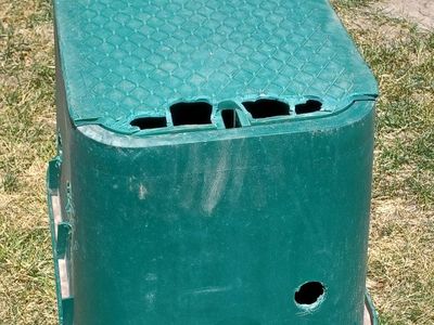 sprinkler valve box with broken lid