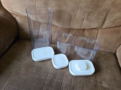 3 OXO pop snap plastic containers