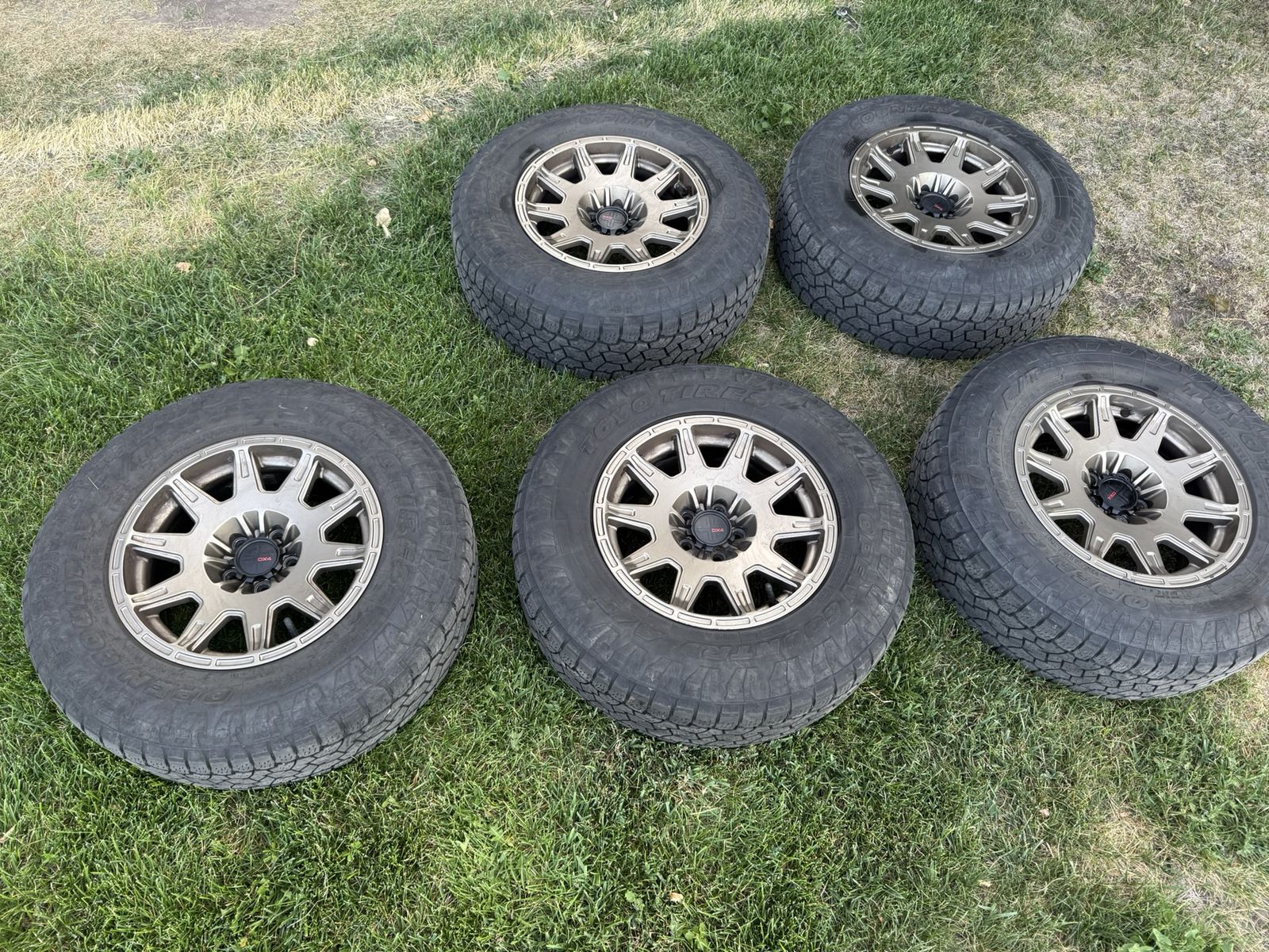 Five 215/75R15 Toyo Open Country ATIII on DX4 X-Trail 15x7 5x100 Wheels