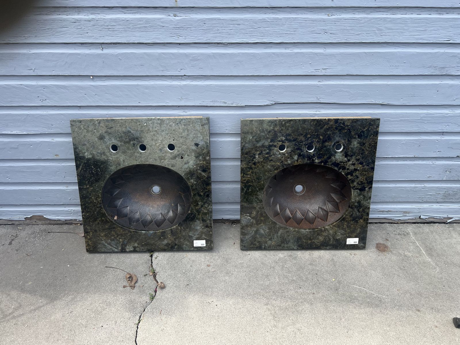 Copper sinks with granite countertops