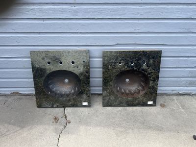Copper sinks with granite countertops
