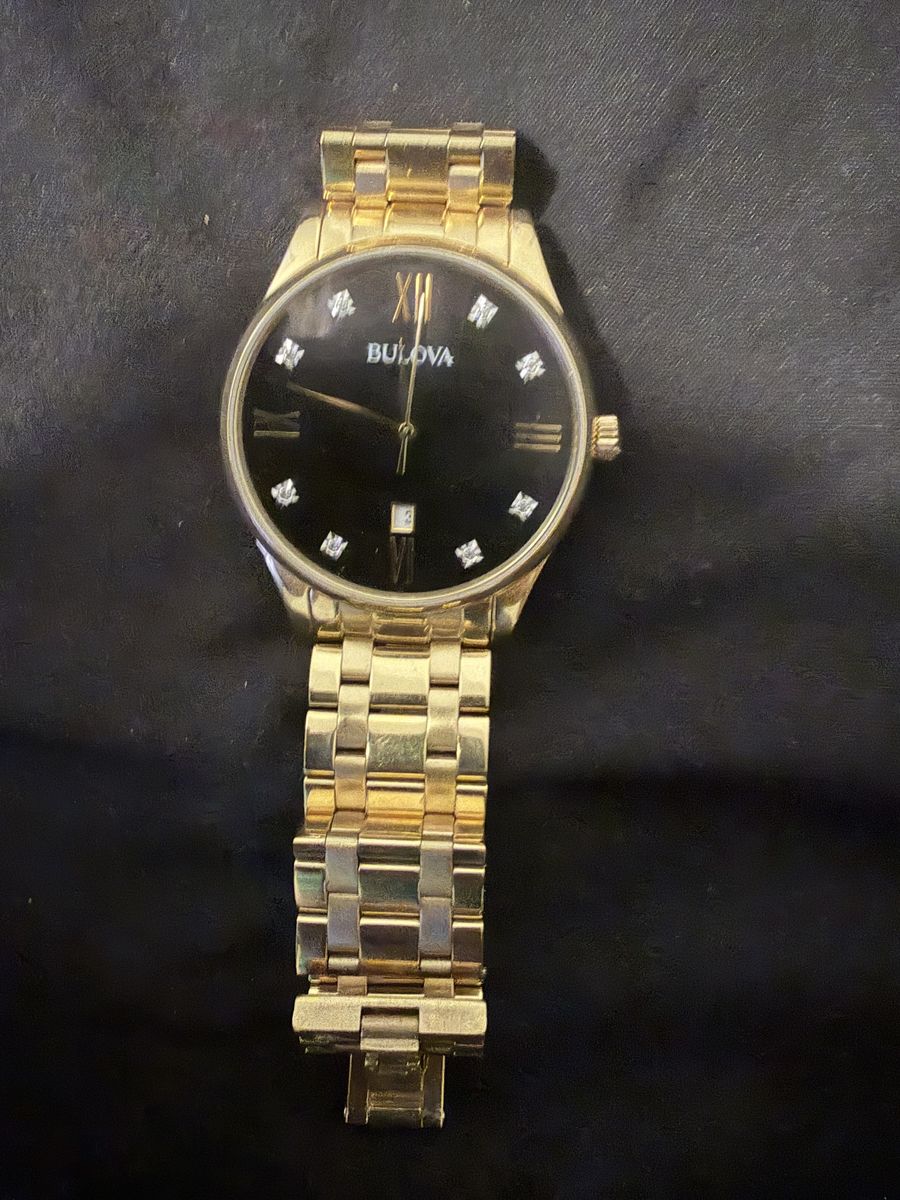 Gold Bulova watch