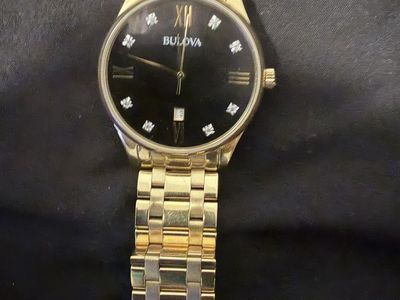 Gold Bulova watch