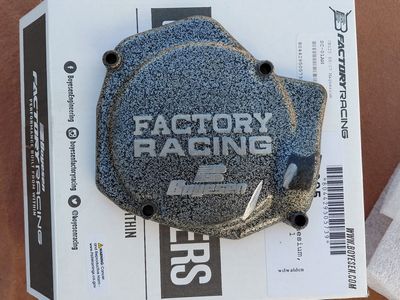 Boyesen magnesium stator cover and stock oem clutch cover for a '98-'99 Honda CR125r