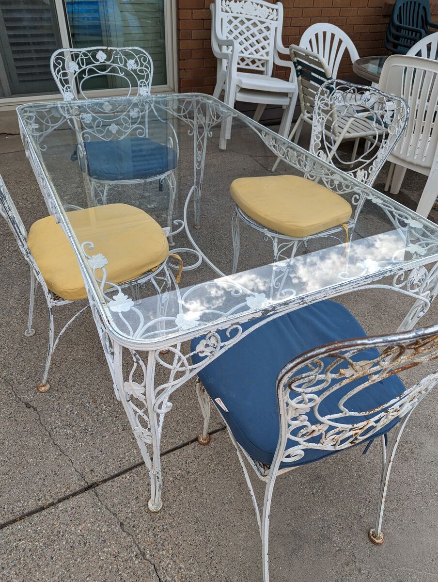 Antique wrought iron table and 4 chairs