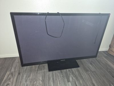 55" Samsung Tv and 2 coolers