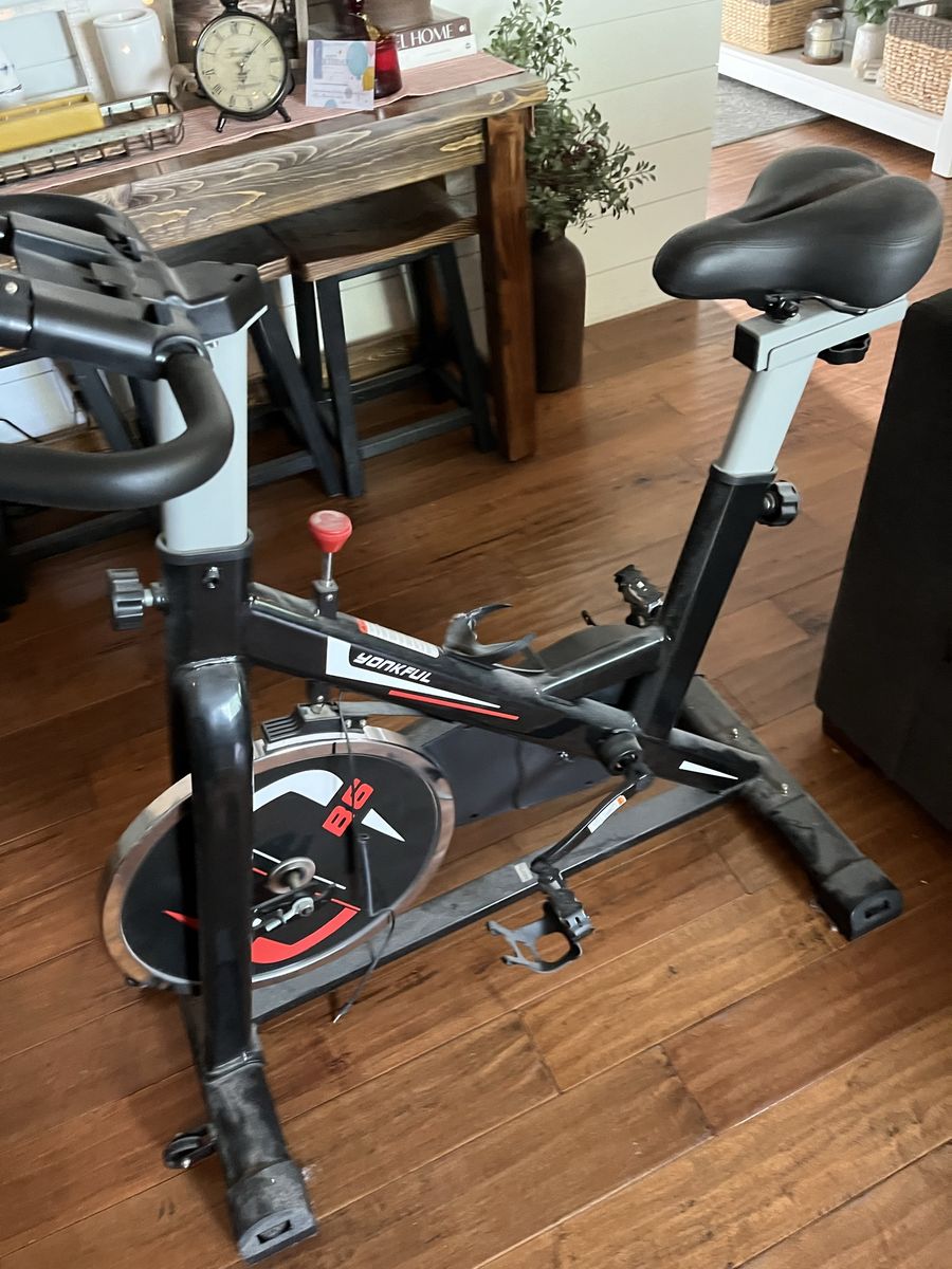 Yonkful B6 exercise bike with a belt drive system and adjustable seat