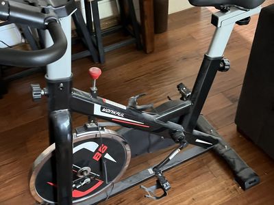 Yonkful B6 exercise bike with a belt drive system and adjustable seat