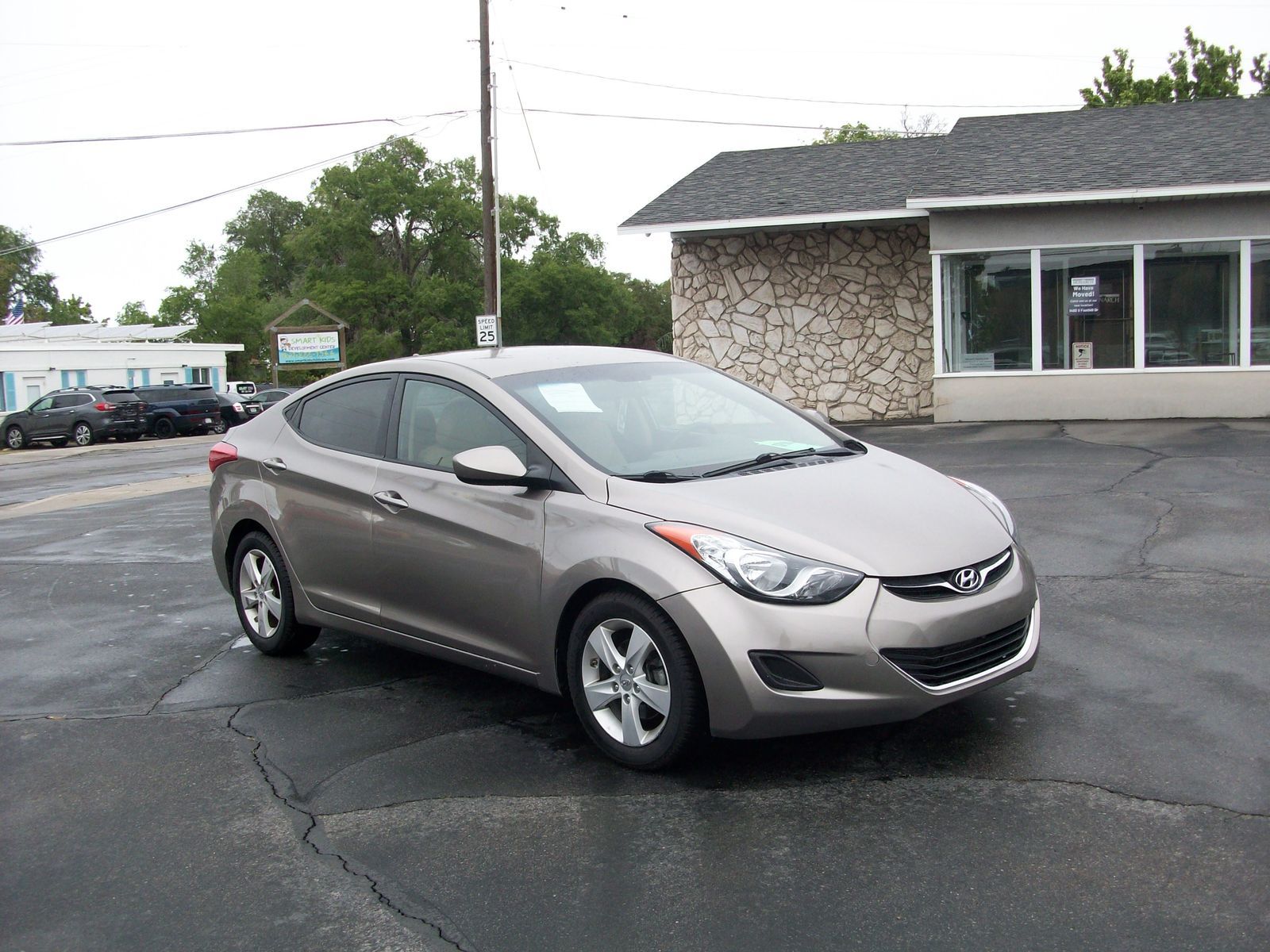 2013 Hyundai Elantra GLS — rebuilt & branded title, 14% below market